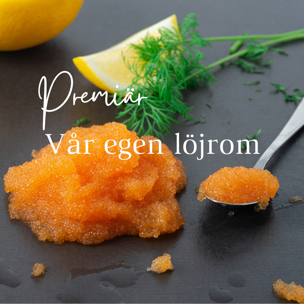 Vår egen löjrom, hållbart beredd. Bild på löjrom på en bricka av skiffer, tillsammans med en dillkvist och en citronklyfta.